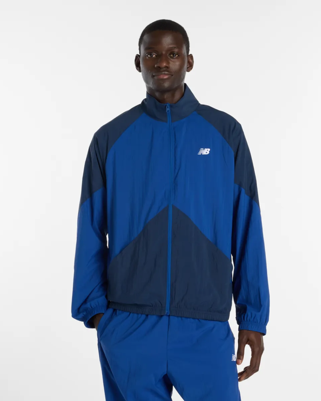 Jaqueta New Balance Sport Legacy Woven Azul